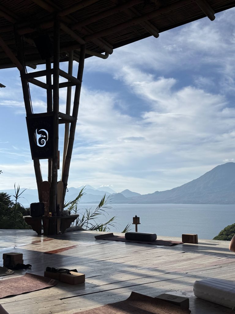 Open-air yoga deck at Eagle’s Nest with volcano and Lake Atitlán view