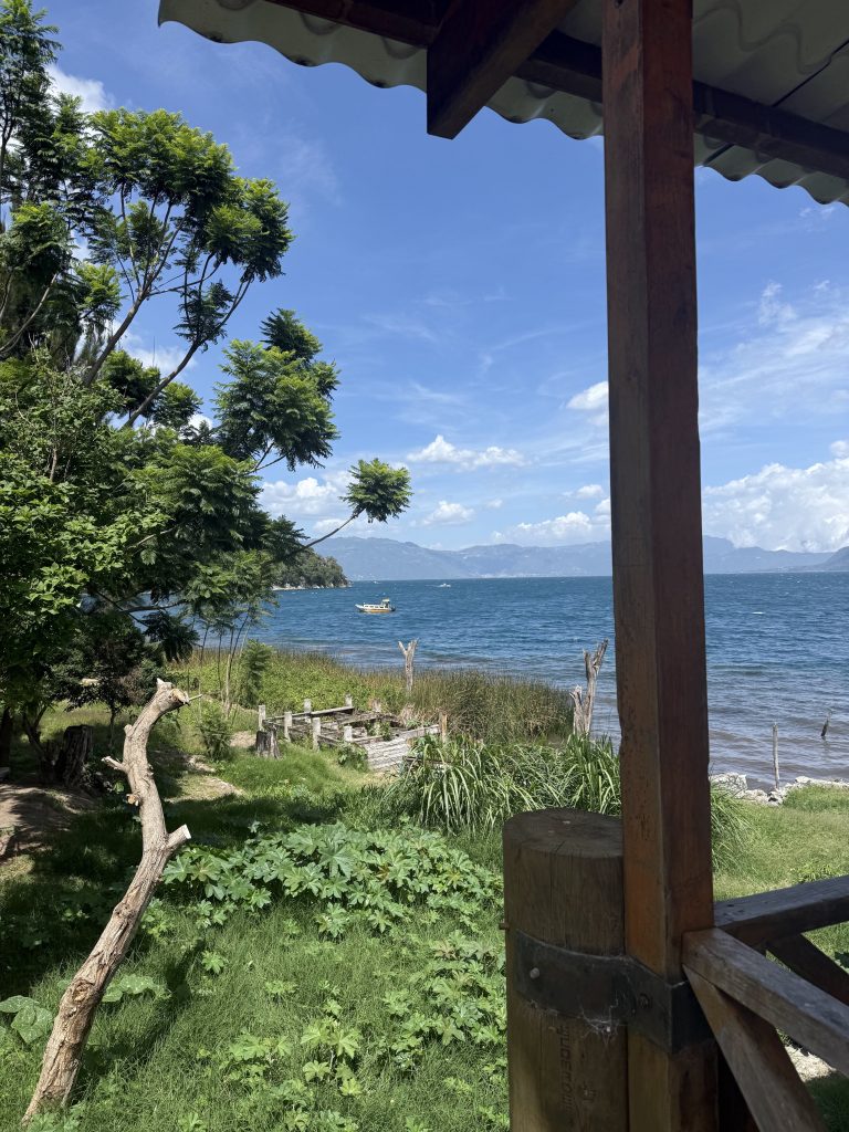 Wooden lakeside deck overlooking Lake Atitlán from San Marcos.