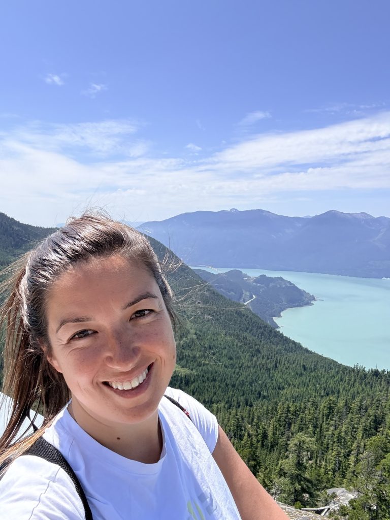 Travel selfie with Howe Sound and mountain views at the Sea to Sky Gondola