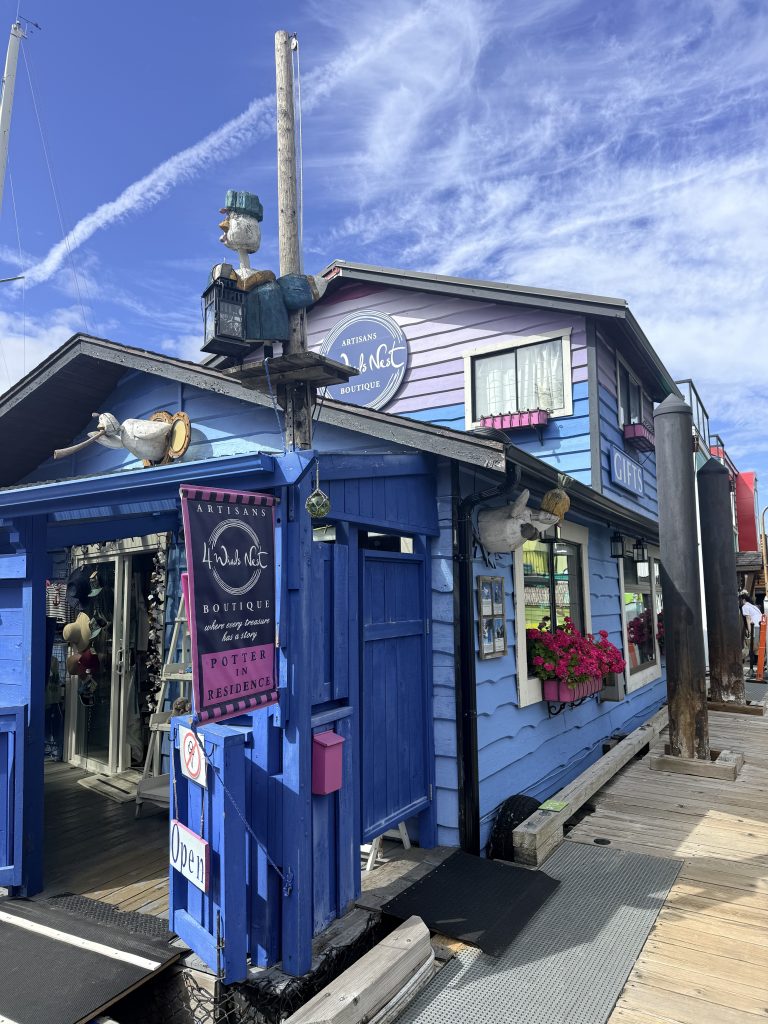 Colourful artisan boutique building at Fisherman’s Wharf in Victoria, British Columbia.