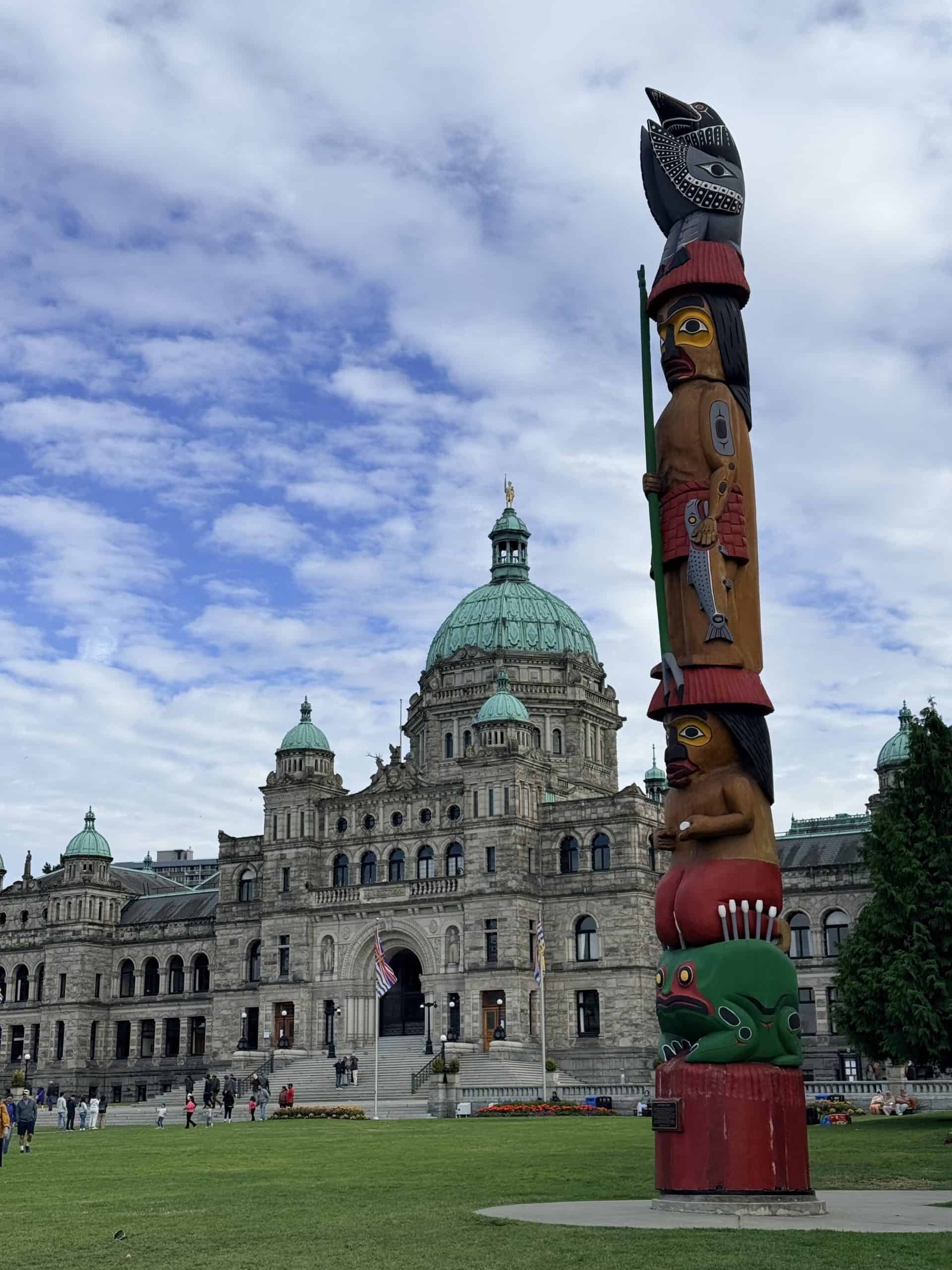 British Columbia Legislature and totem pole in Victoria on Vancouver Island