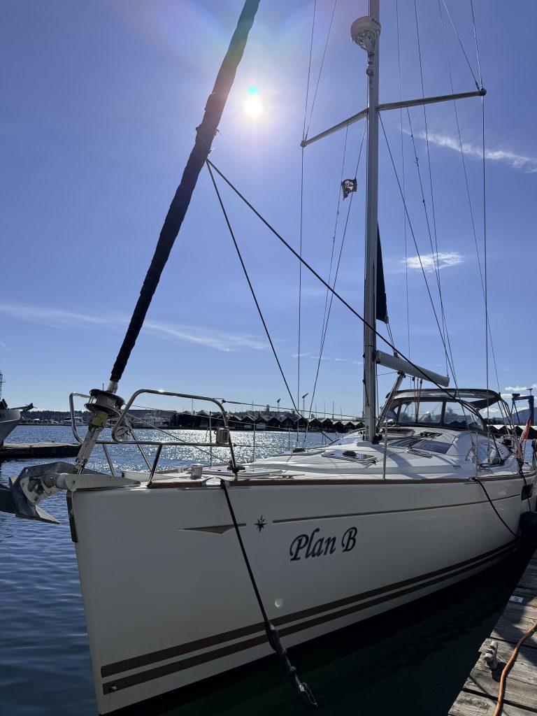 Sailboat docked at a Vancouver marina before a sailing trip on English Bay.