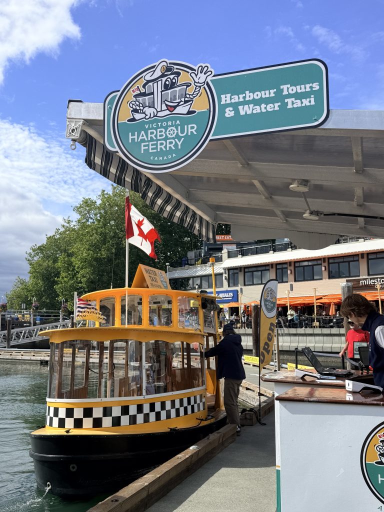 Victoria Harbour Ferry water taxi docked at the Inner Harbour in Victoria, British Columbia.