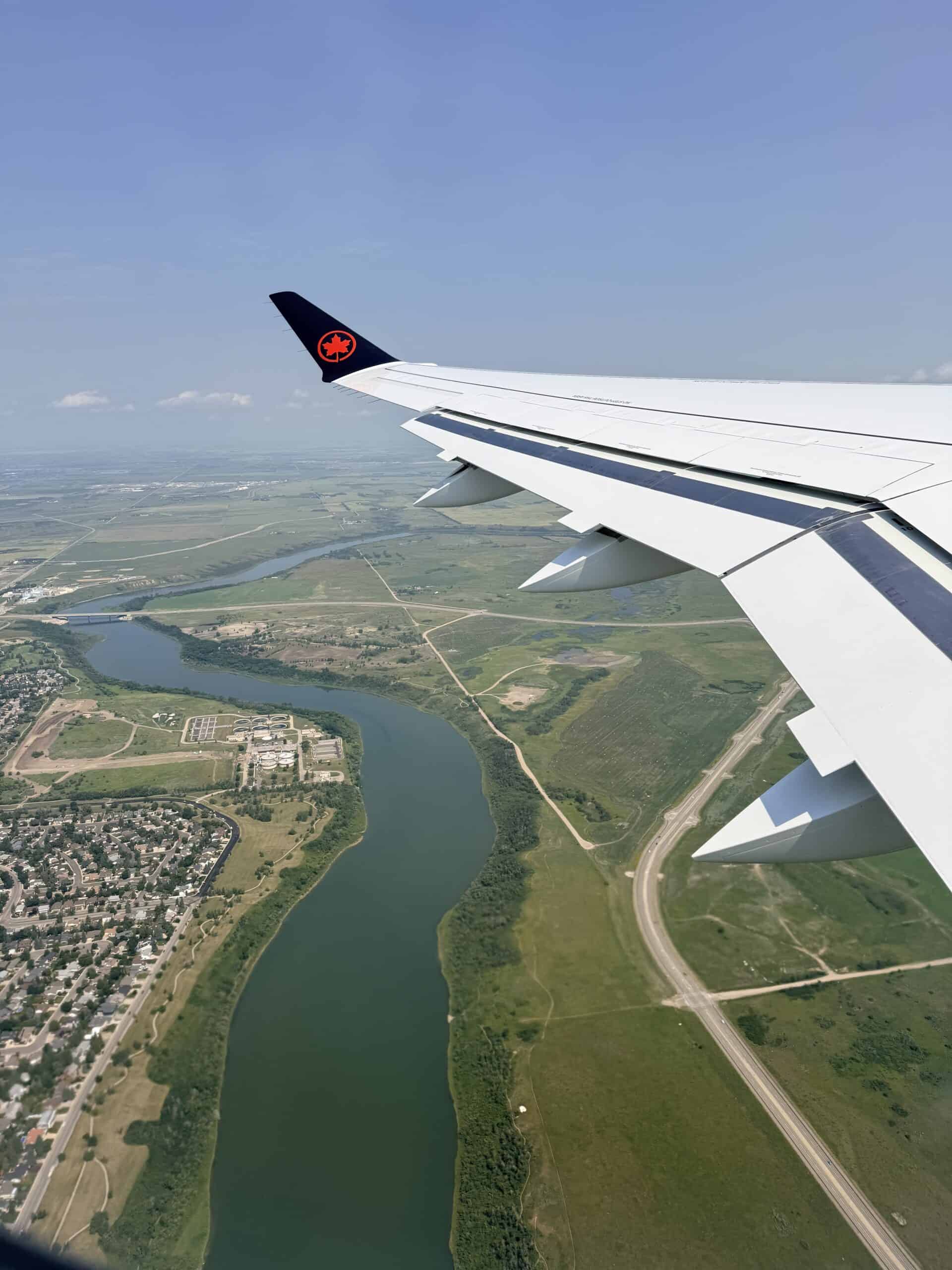 View from an Air Canada airplane window for an Aeroplan travel points guide