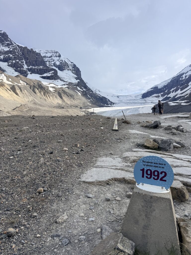 1992 glacier marker showing the former extent of Athabasca Glacier in Jasper National Park, Alberta.