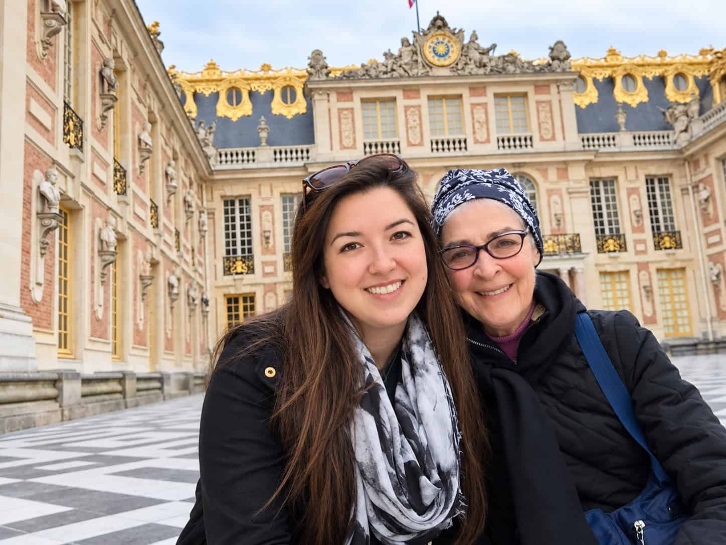 Woman with her grandmother at the Château de Versailles in France