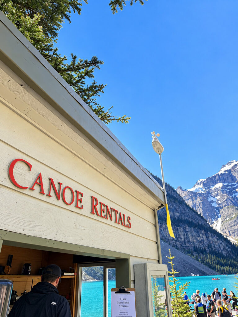 Moraine Lake canoe rental stand beside the turquoise lake in Banff National Park