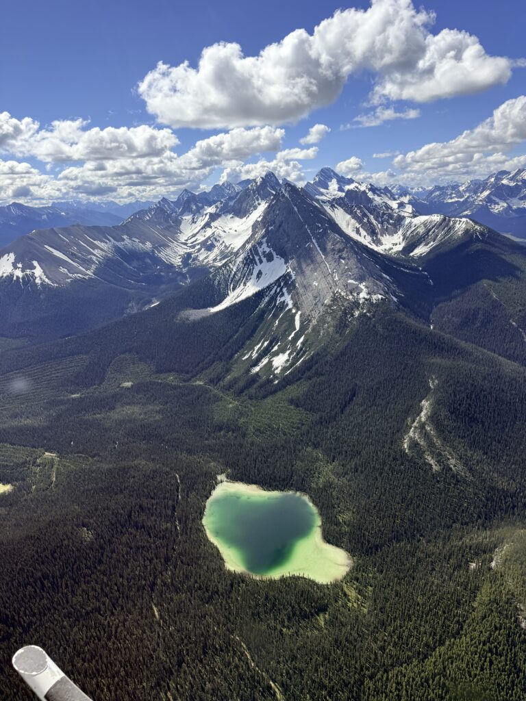 Dramatic mountain peaks in the Mount Assiniboine area seen during a helicopter tour from Canmore.