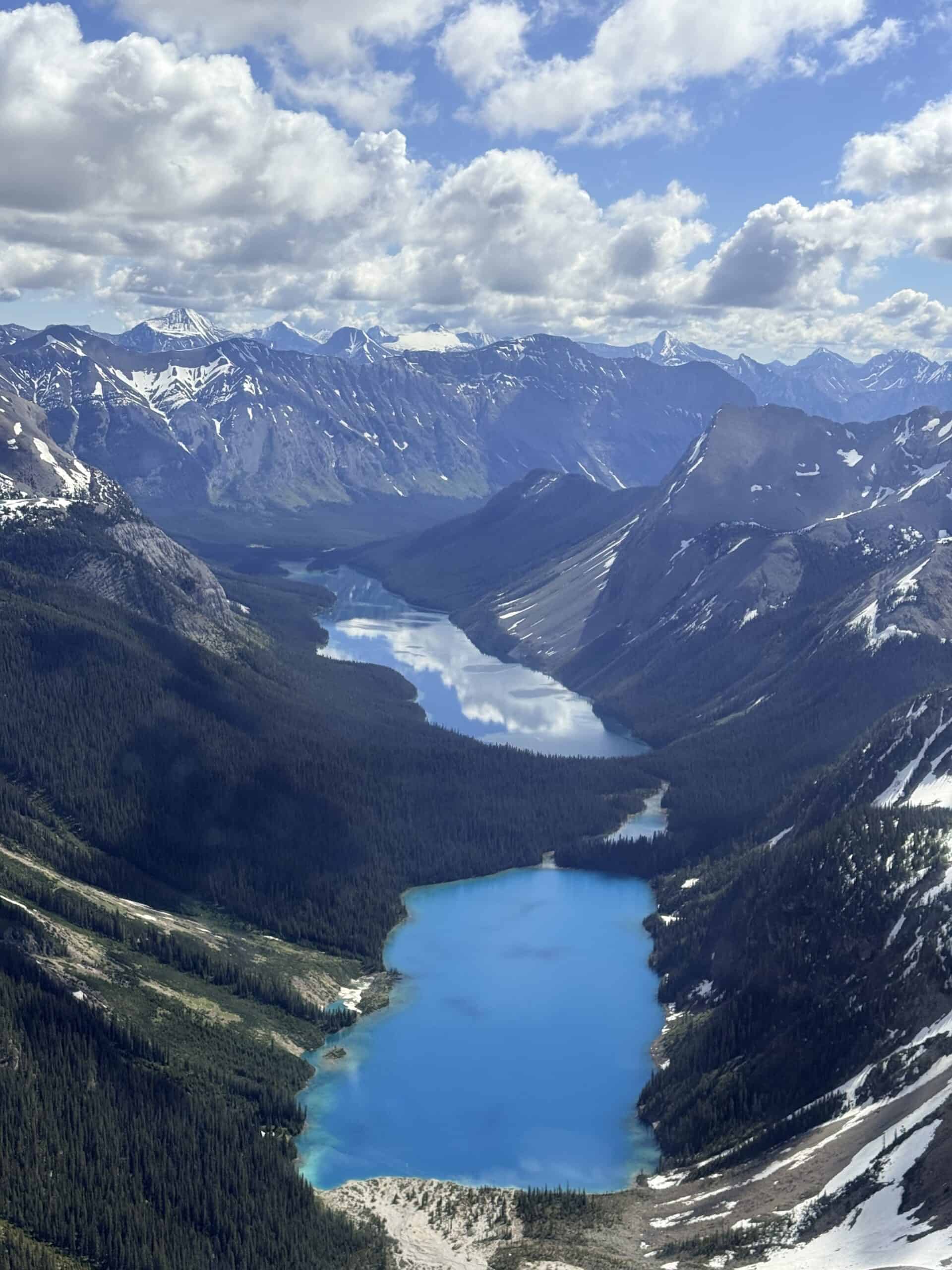 Mountain lakes viewed from above during a helicopter tour of the Canadian Rockies.