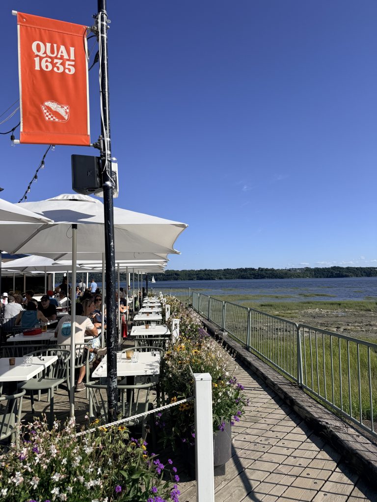 Outdoor terrace at Quai 1635 overlooking the St. Lawrence River in Quebec City