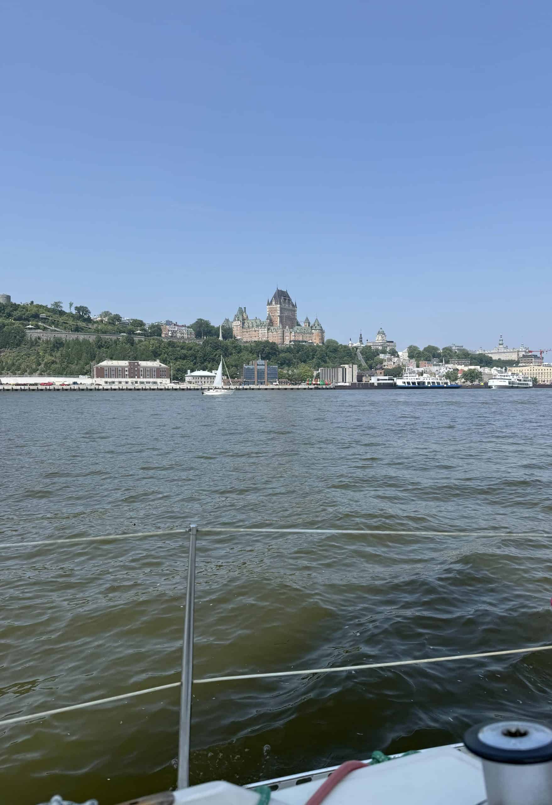 View of Quebec City and Château Frontenac from a sailboat on the St. Lawrence River.