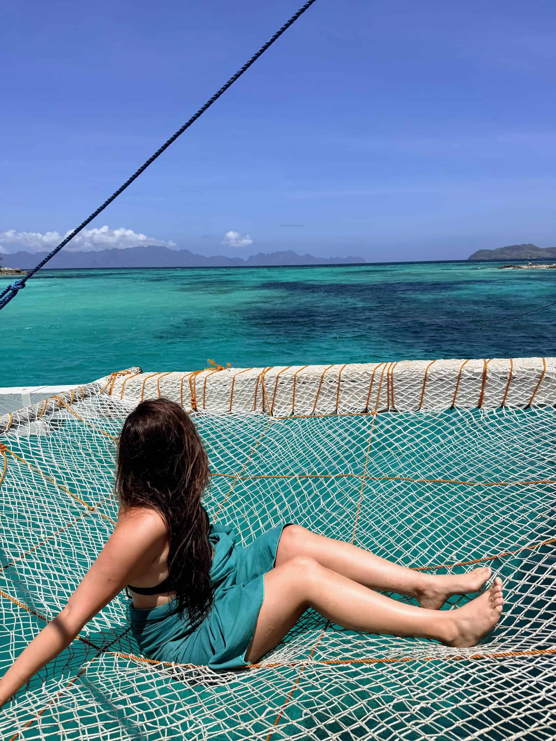 Annie exploring Malacory Island during a three-day El Nido to Coron boat expedition in Palawan, Philippines