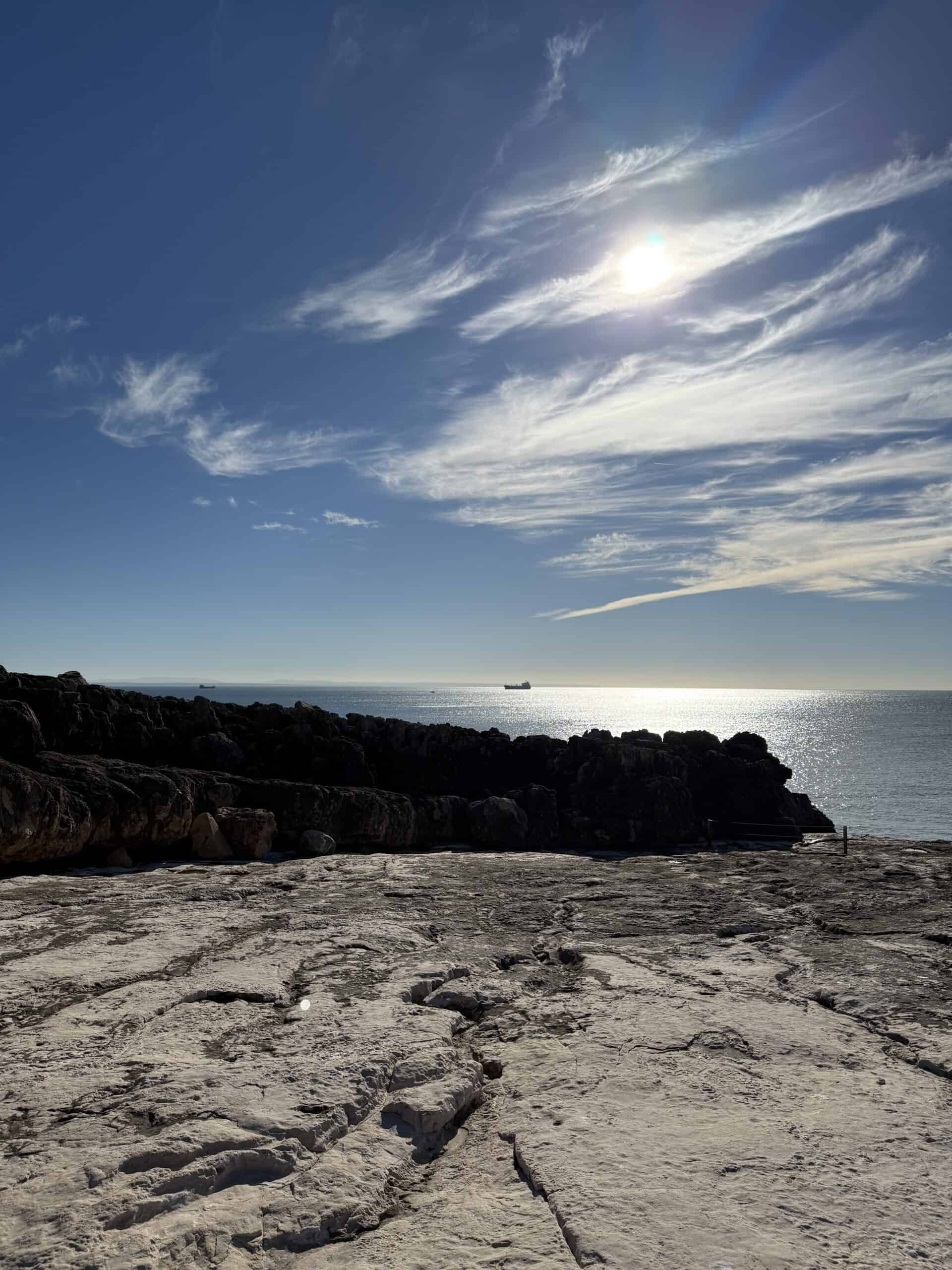 Pale rock formations beside the Atlantic Ocean at Boca do Inferno in Cascais.