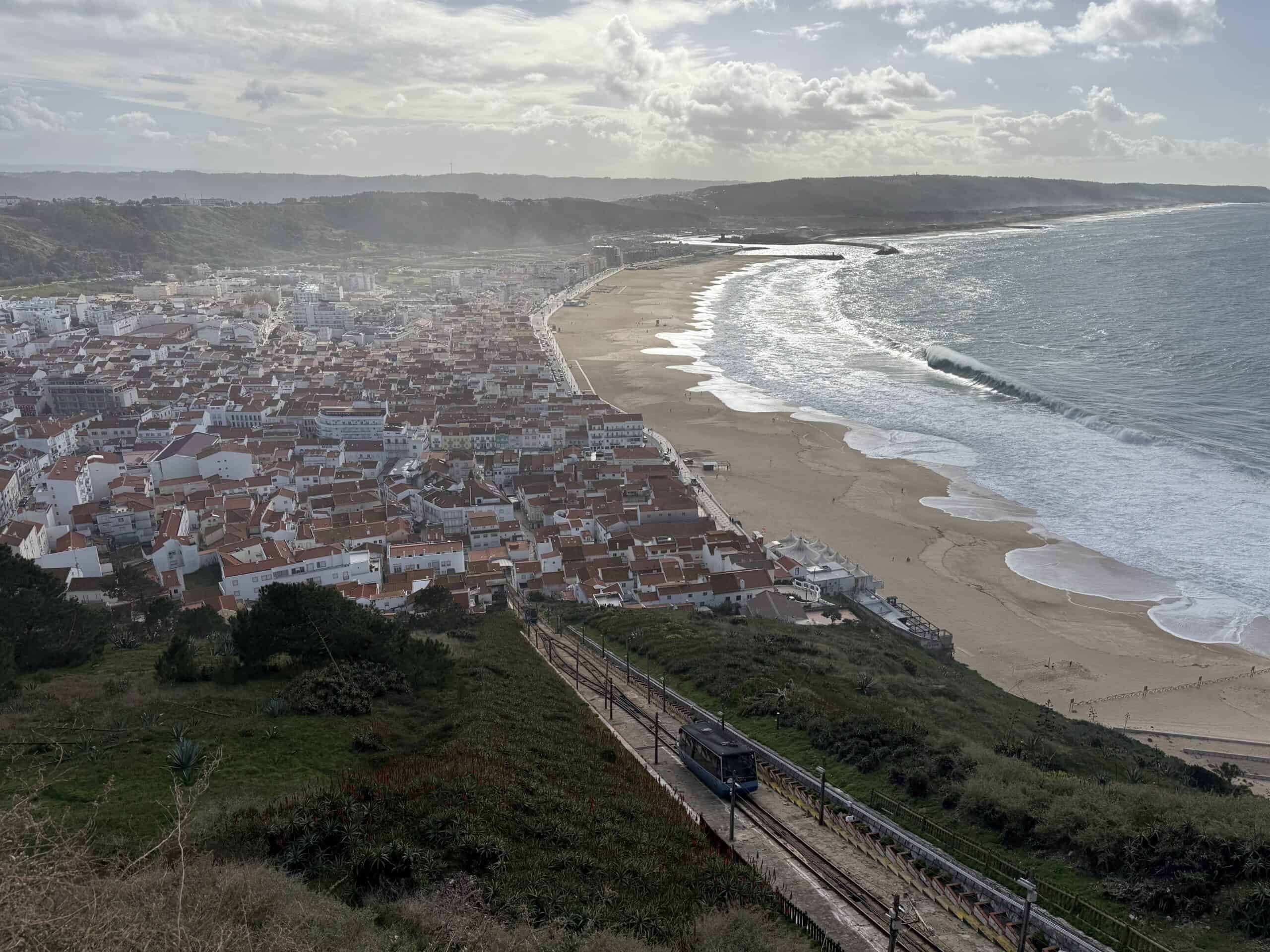 Nazaré funicular travelling between Sítio and the lower town, overlooking Praia da Nazaré and the Atlantic coast