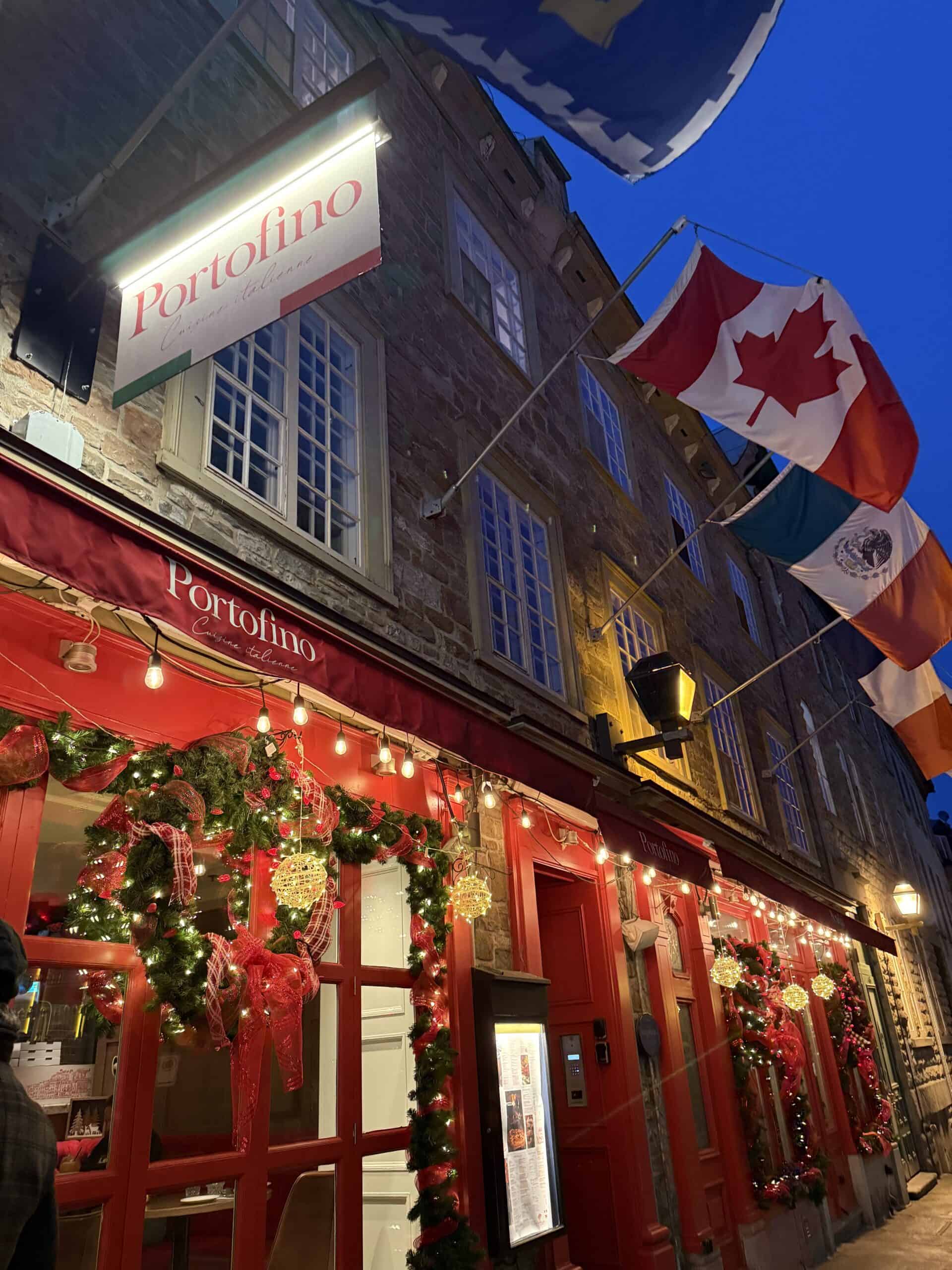 Portofino Italian restaurant in Old Quebec City, with its historic stone facade and festive Christmas decorations.